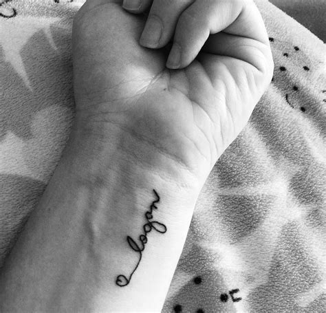 tattoo in hand name|name tattoos on wrist.